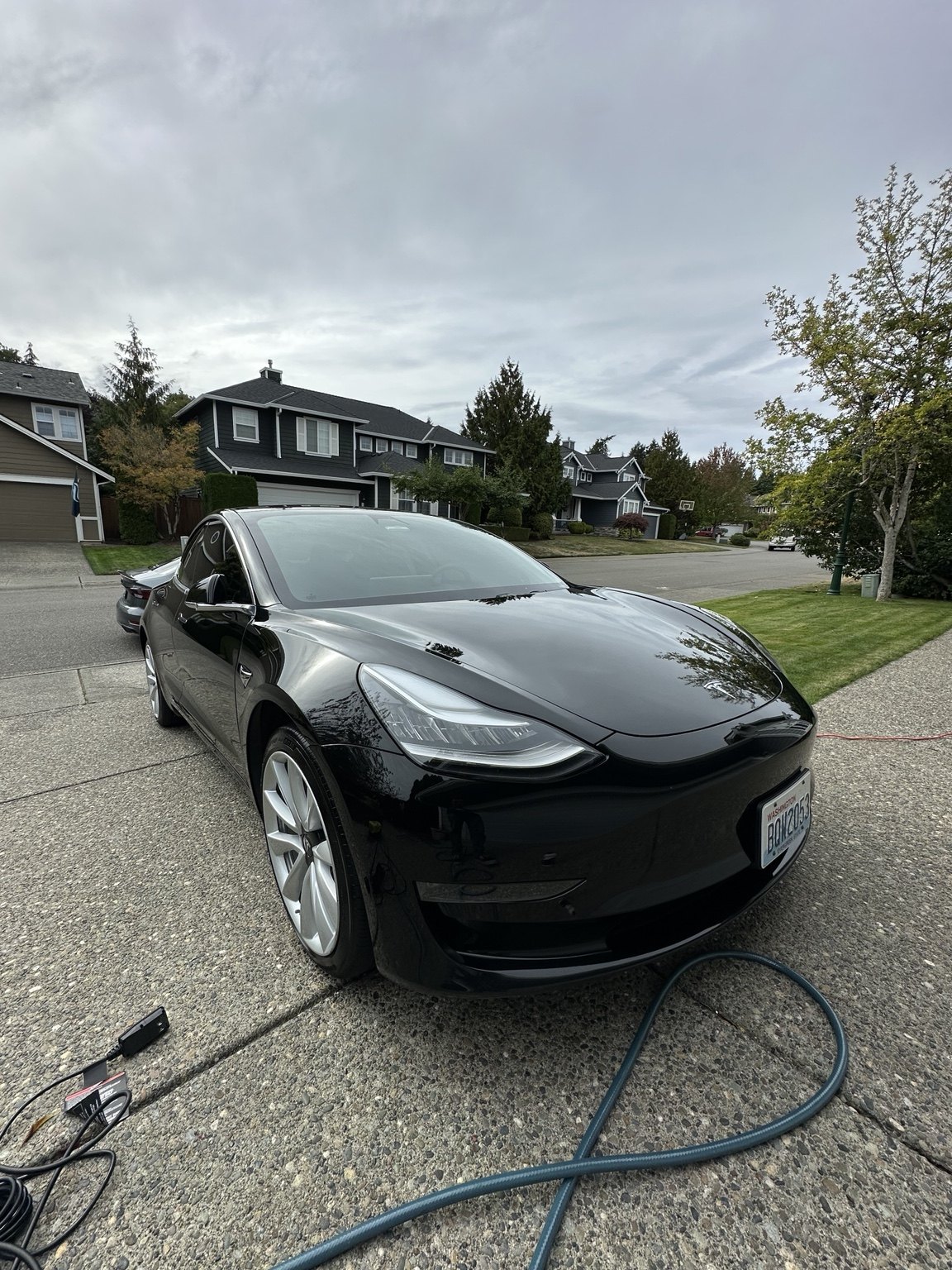 Black Tesla with a deep glossy finish