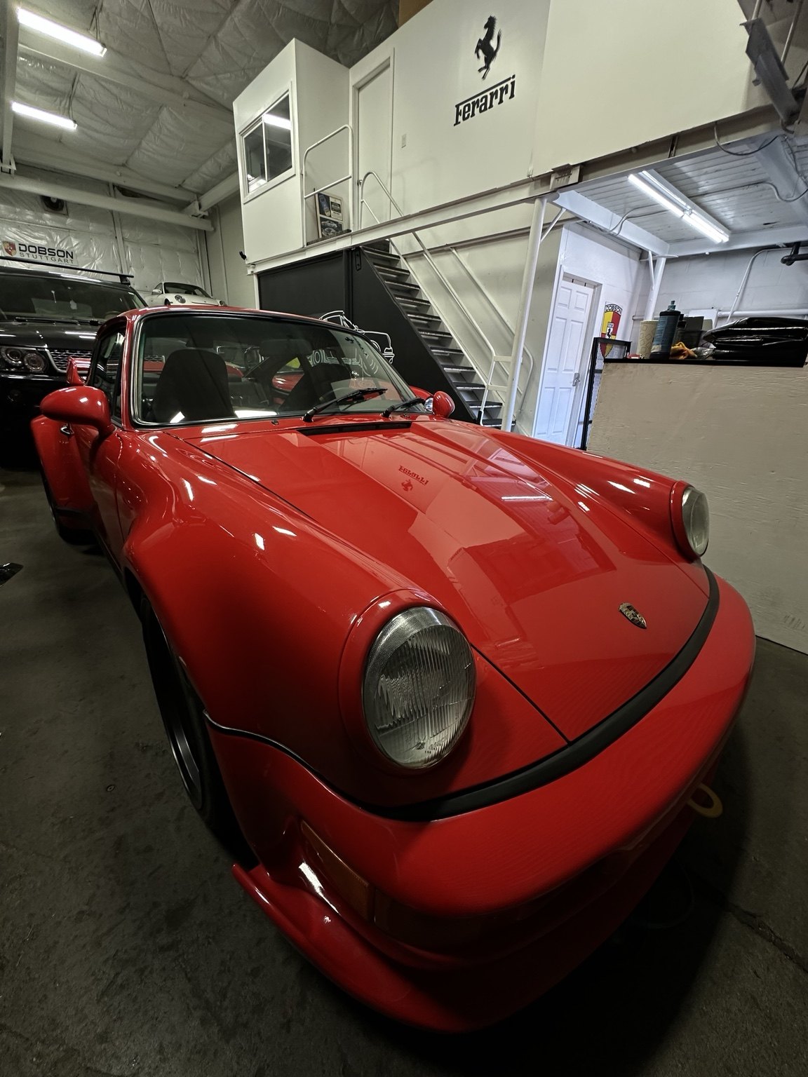 Red sports car in studio