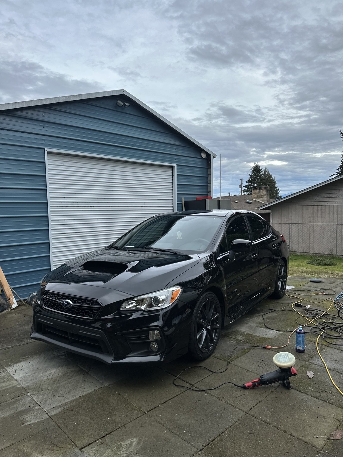 Black Subaru after paint correction and ceramic coating