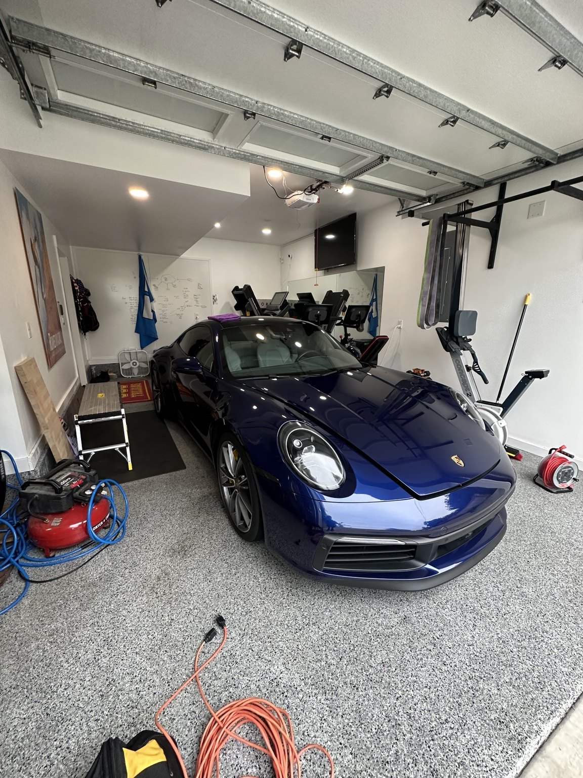 Blue Porsche after paint correction, headlight restoration and ceramic coating
